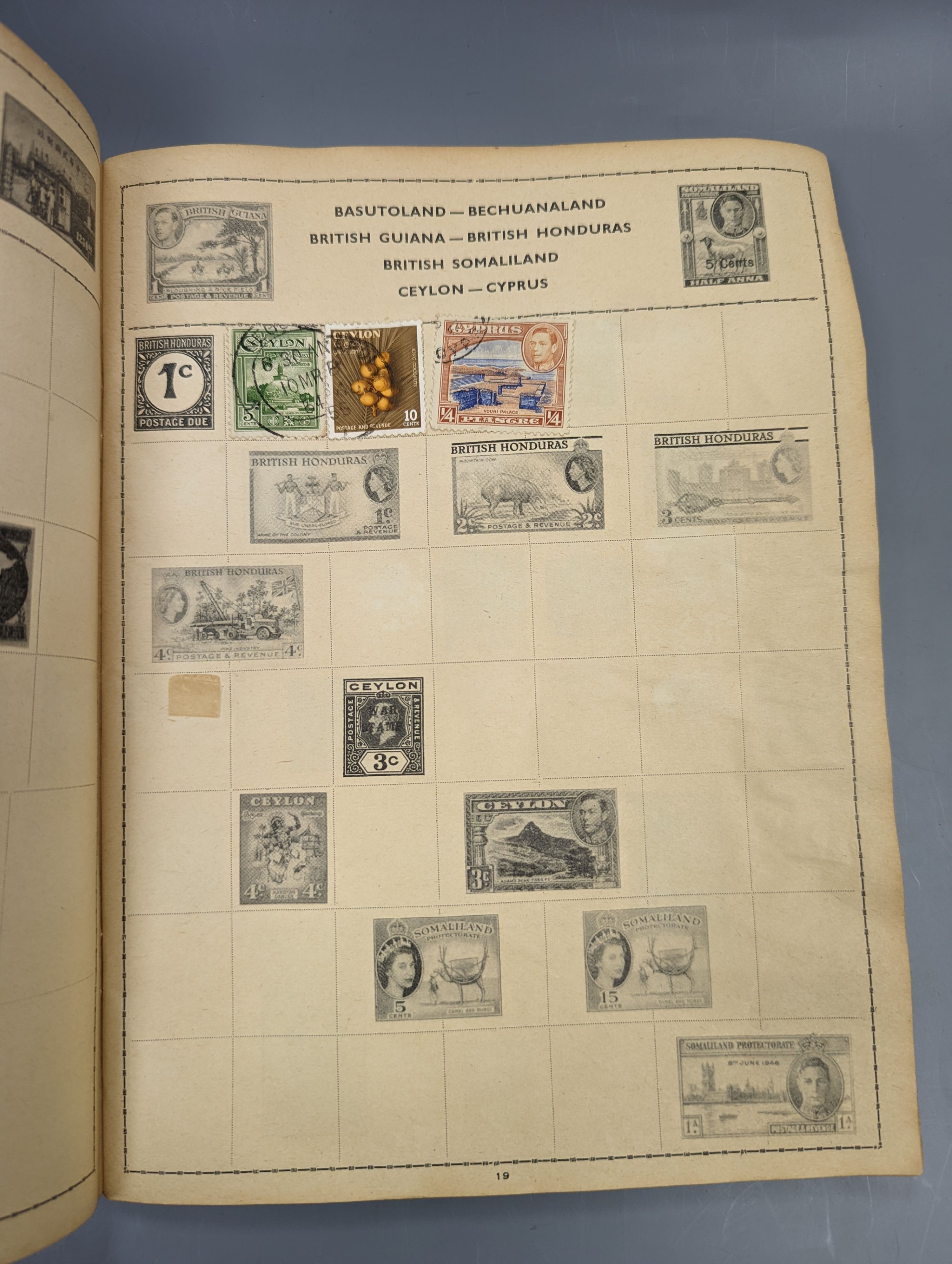 An All Nations stamp album and contents